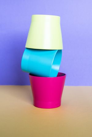 Multicolor vases in a colorful background