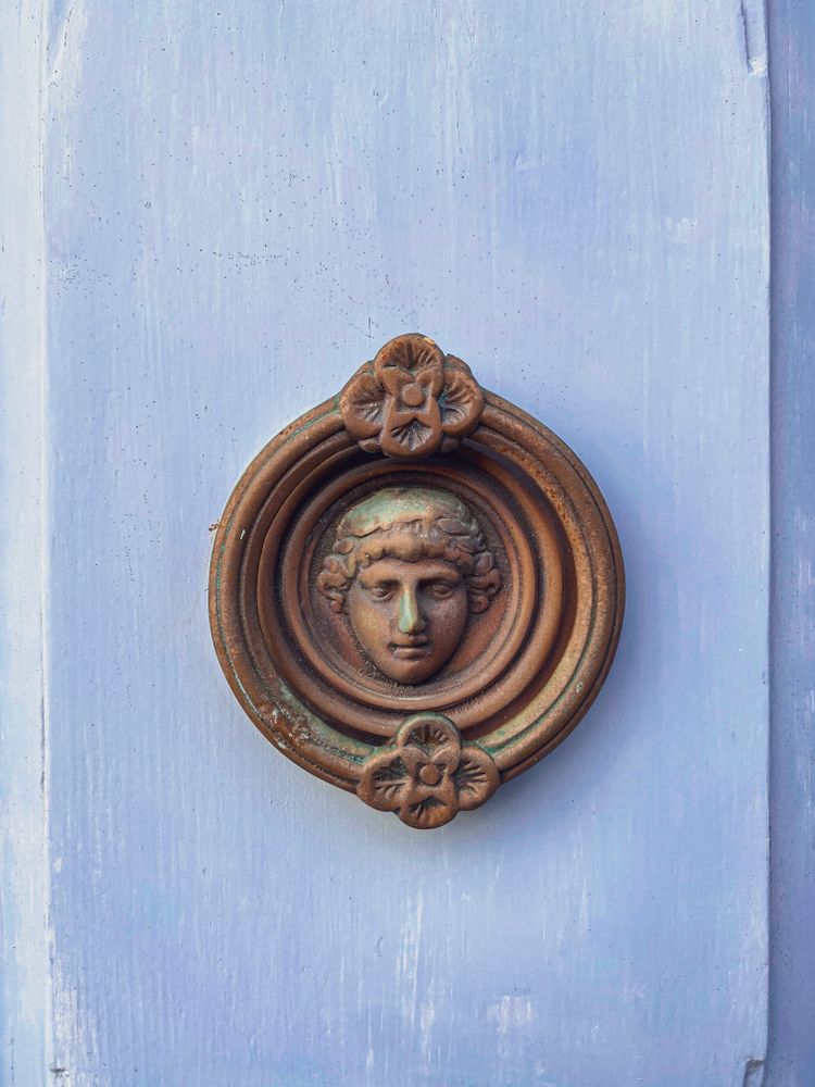Patmian knocker close up of figurehead in ring