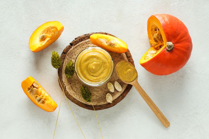 Skin care and face care concept - pumpkin cosmetic