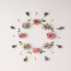 Circular flower arrangement on light background