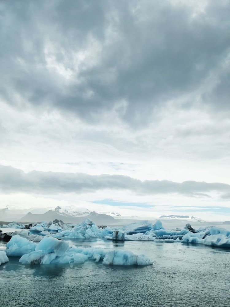 Majestic icebergs floating in icelandic glacier lagoon