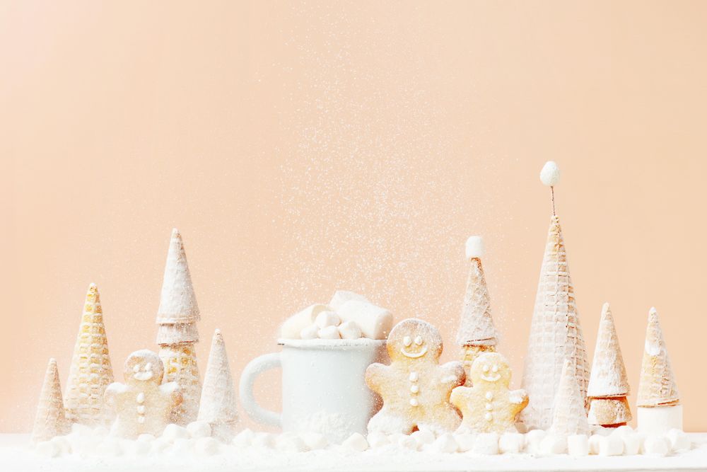 Beige scene of gingerbread cookies and waffle pine trees