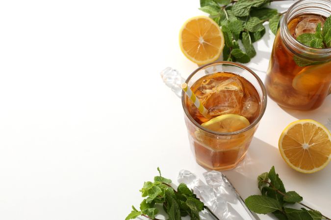 Cold tea with fresh oranges and mint leaves