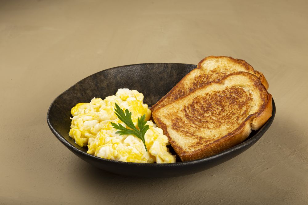 Breakfast. Scrambled egg with toast.