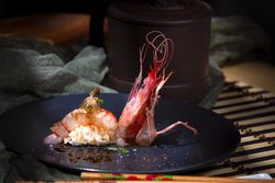 Tasty shrimps decorated on plate in restaurant
