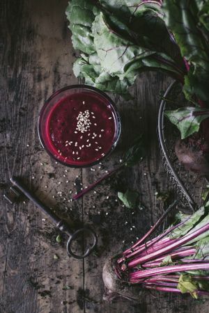Beetroot and fresh smoothie on wooden table
