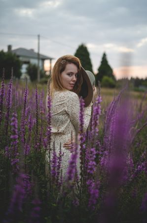 Romantic women in salvia field