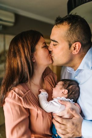 Happy family with newborn baby