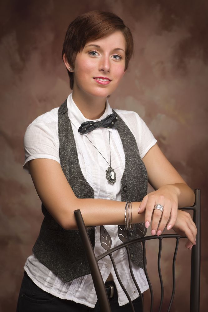 Red Haired Young Adult Female Portrait Leaning on Chair