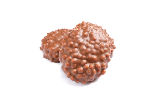 Chocolate cookies with caramel filling isolated on plain background
