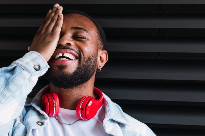 Happy Black man with headphones