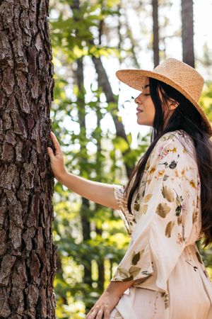 Woman enjoying a day in nature in the forest