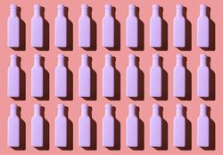 Light pink painted glass bottles
