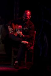 Man playing guitar on stage