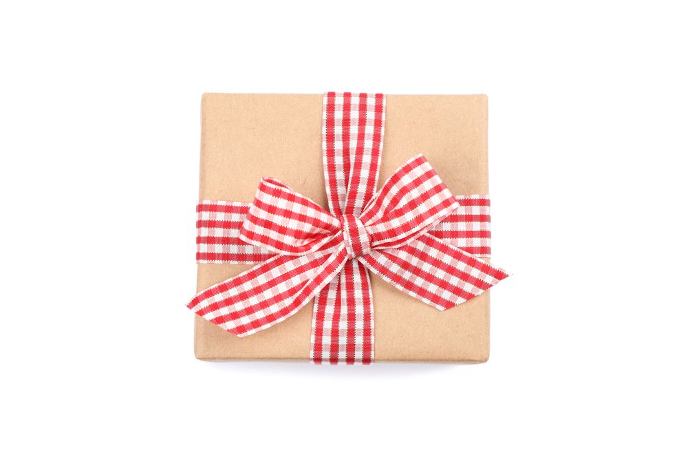 Beautiful gift box with bow isolated on blank background