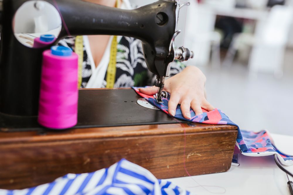 Woman in a sewing school