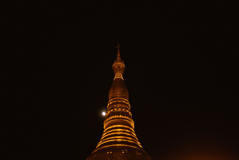 Wonderful high tower with illuminated lamps at night