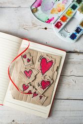 Love symbols hand painted in watercolor