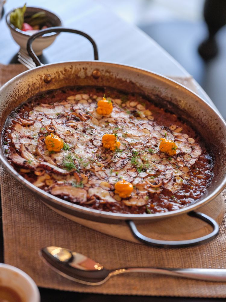 Delicious paella on board on napkin