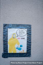 Handmade sign with graphic of The Rock taped on wall at public pandemic testing site 4mWzQ0