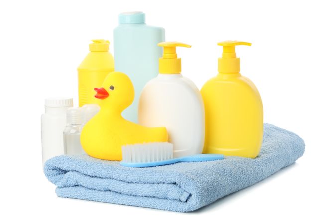 Baby hygiene accessories isolated on light background