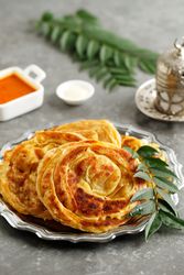 Roti parata or roti canai with sauce