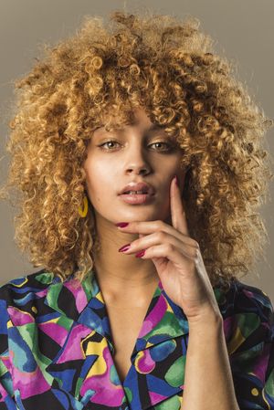 Retro woman with curly hair