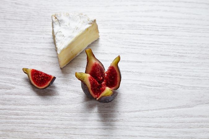 Chunk of brie cheese with figs