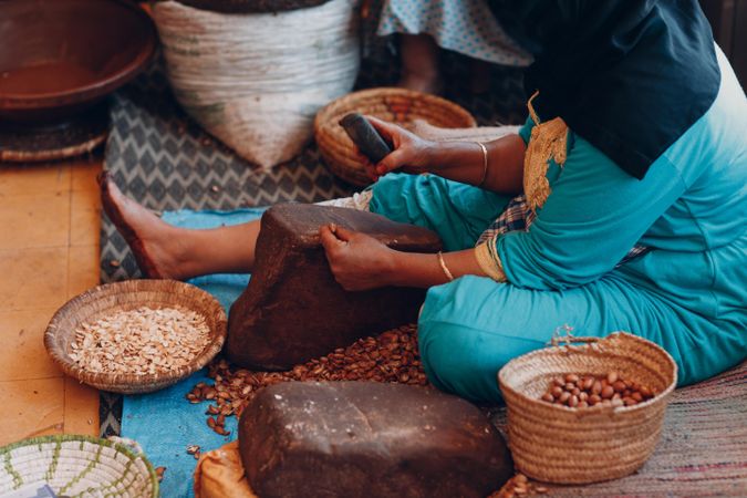 Woman grinding spices