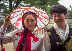 Jeonju, South Korea - August, 05 2017: Asian couple in traditional Korean clothes