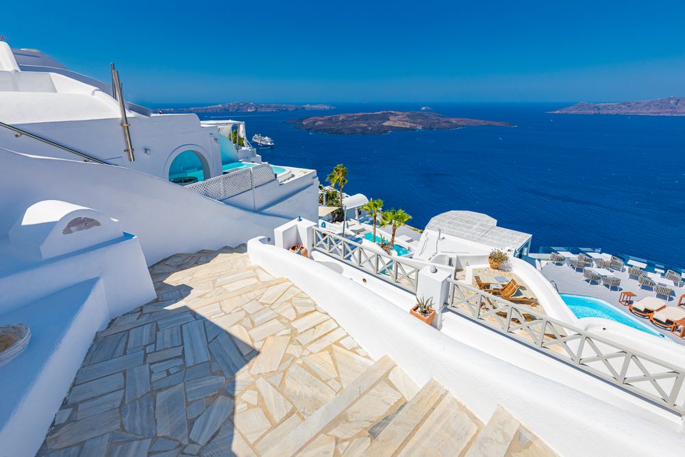 Sunny deck overlooking holiday spot in Santorini