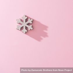 Wooden snowflake Christmas tree decoration with pink background with shadow 4jXZ30