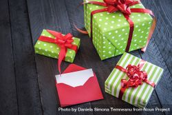 Cheerful wrapped presents and opened letter 49O7n0