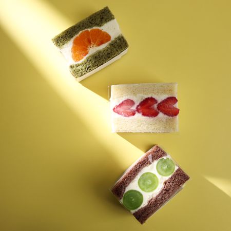 Top View Japanese Fruit Sandwith or Fruit Sando on Yellow Background