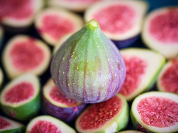 Whole fig placed on halved ones