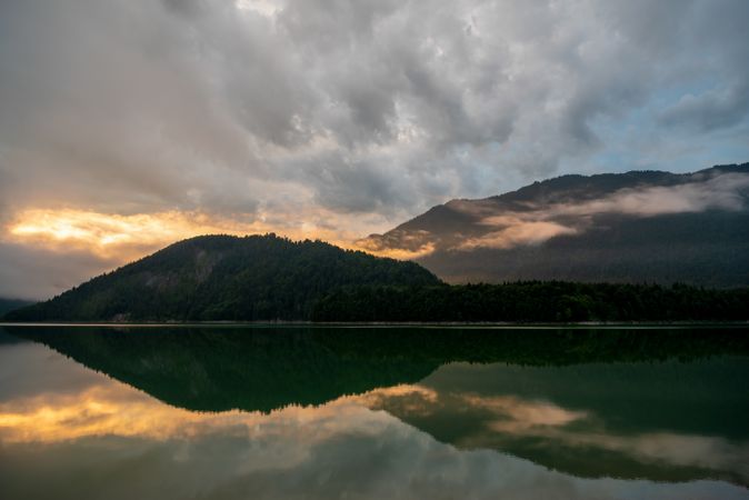 Sunset in the Karwendel Mountains, reflection in Lake Sylvenstein.