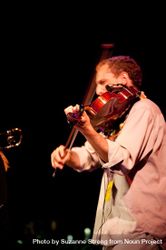 Los Angeles, CA, USA - July 12, 2012: Miguel Atwood-Ferguson playing violin onstage 5oZJG0