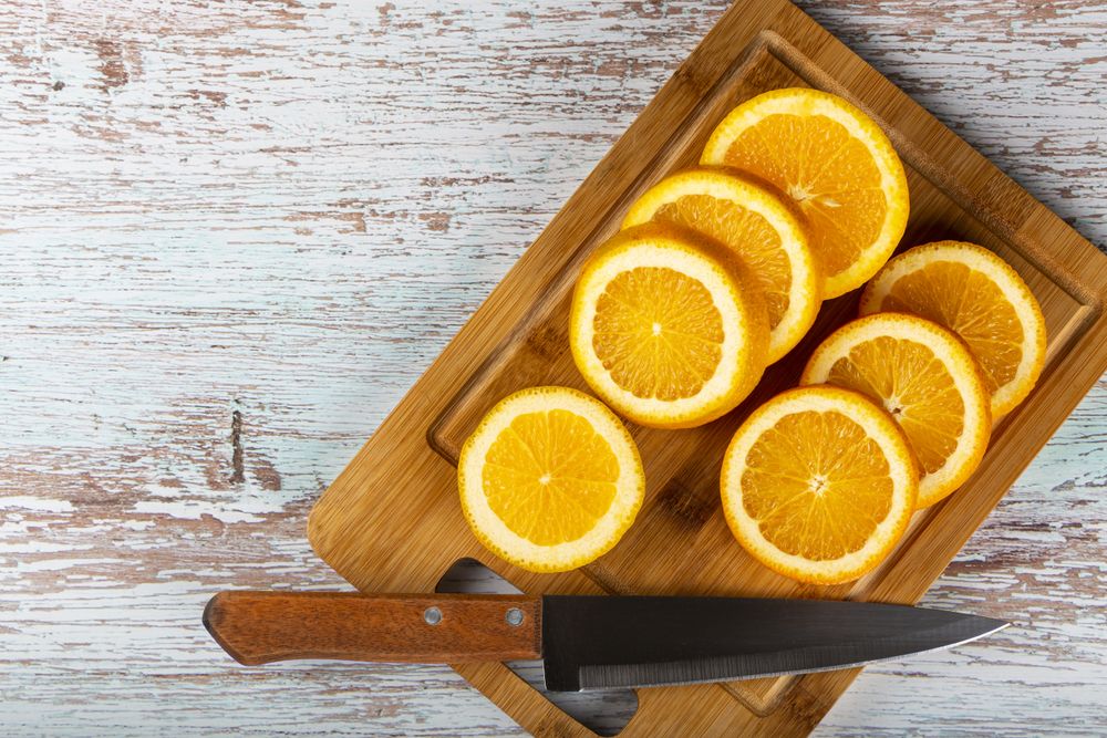 Sliced oranges on the table.