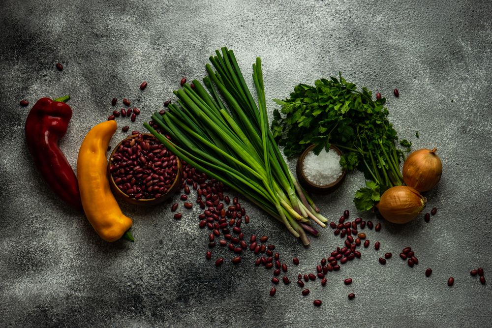 Fresh ingredients on counter for vegetarian chili with beans