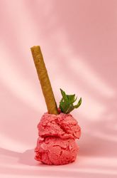 Strawberry ice cream scoops with waffle stick