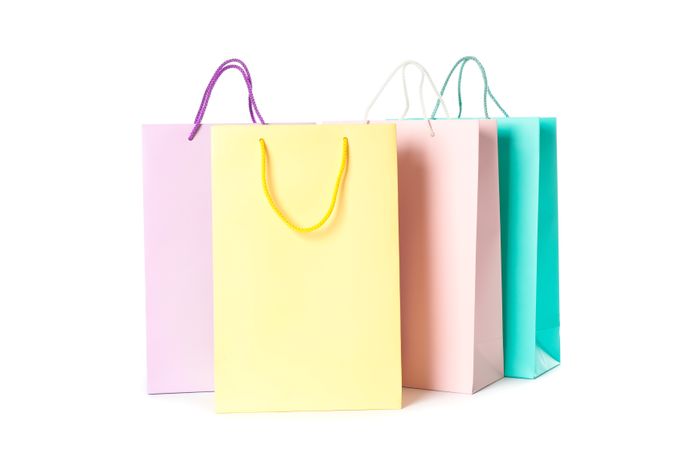 Multicolor paper bags isolated on blank background