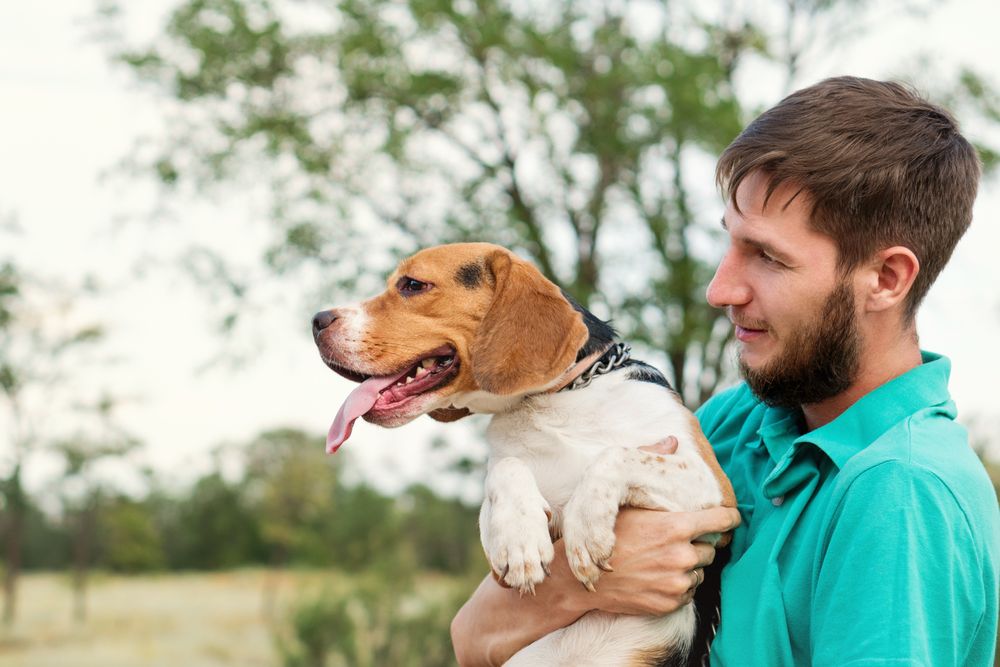 Portrait owner man with dog