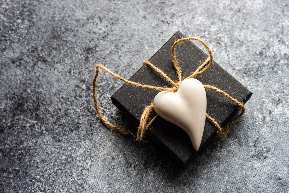 Valentine's day concept with small gift box on grey counter