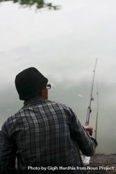 Rear of male fishing 5leGm4