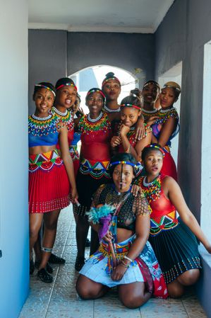Group of smiling young women in South Africa in traditional Zulu attire