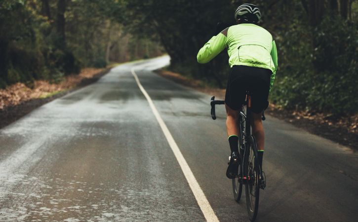 Cyclist practising on a rainy day