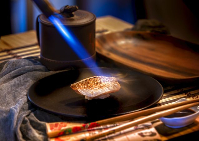 Cooking food with burner on plate