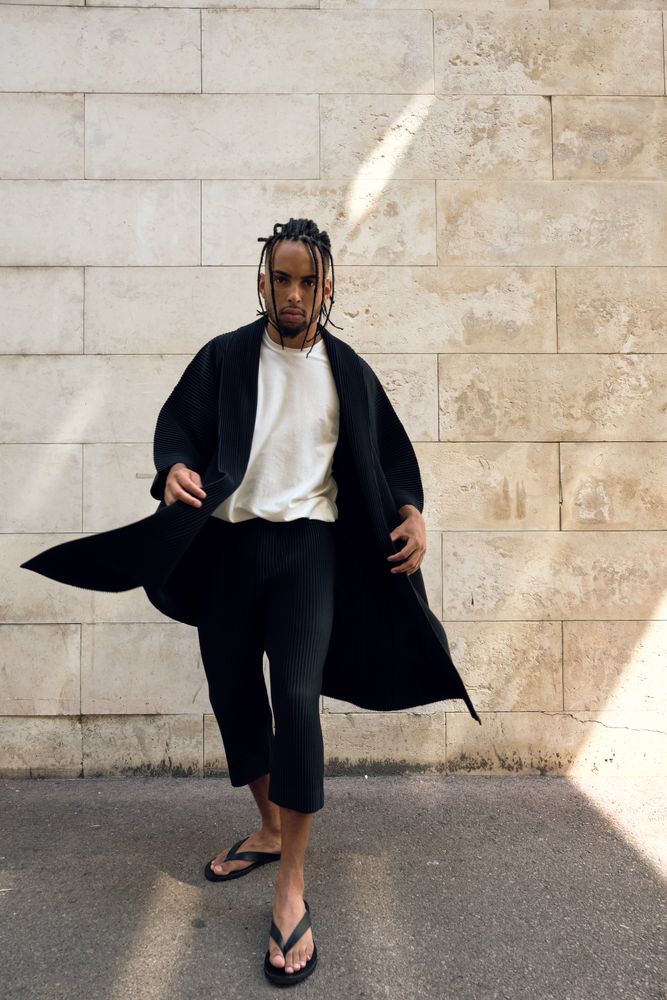 Trendy Black man posing on street