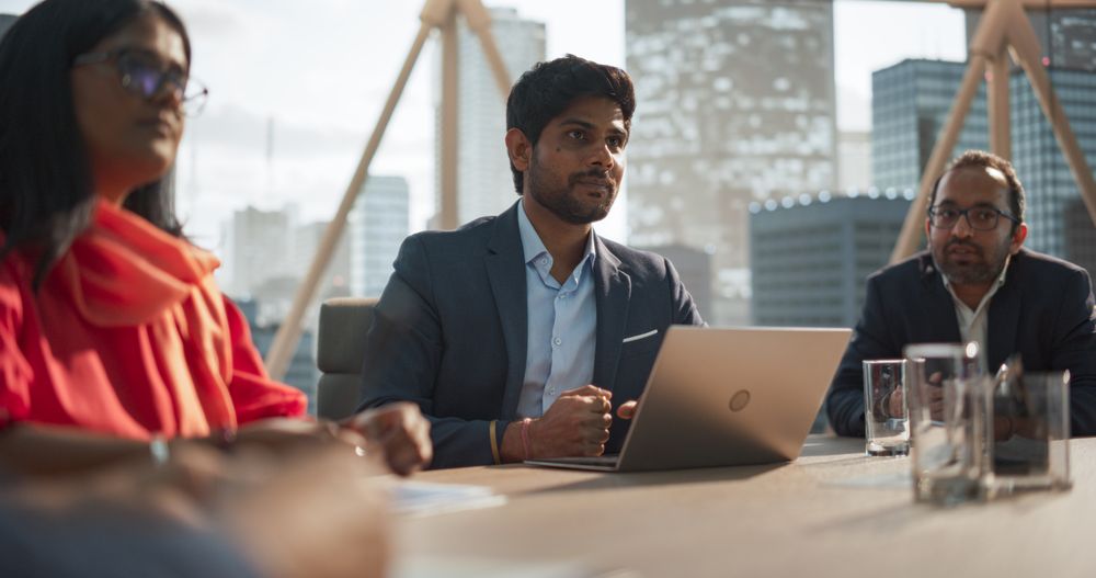 Business People and Partners Discussing Work in an Office