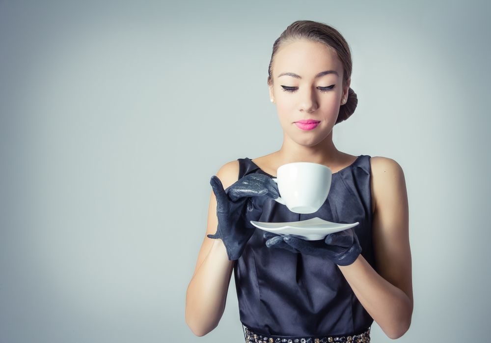 Vintage teenage model with coffee cup